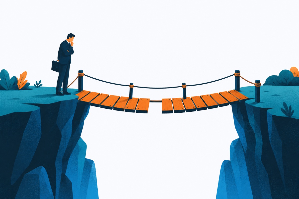 Two cliffs joined by a wooden bridge with one plank missing in the middle, and a small figure standing at the edge looking at the hole.