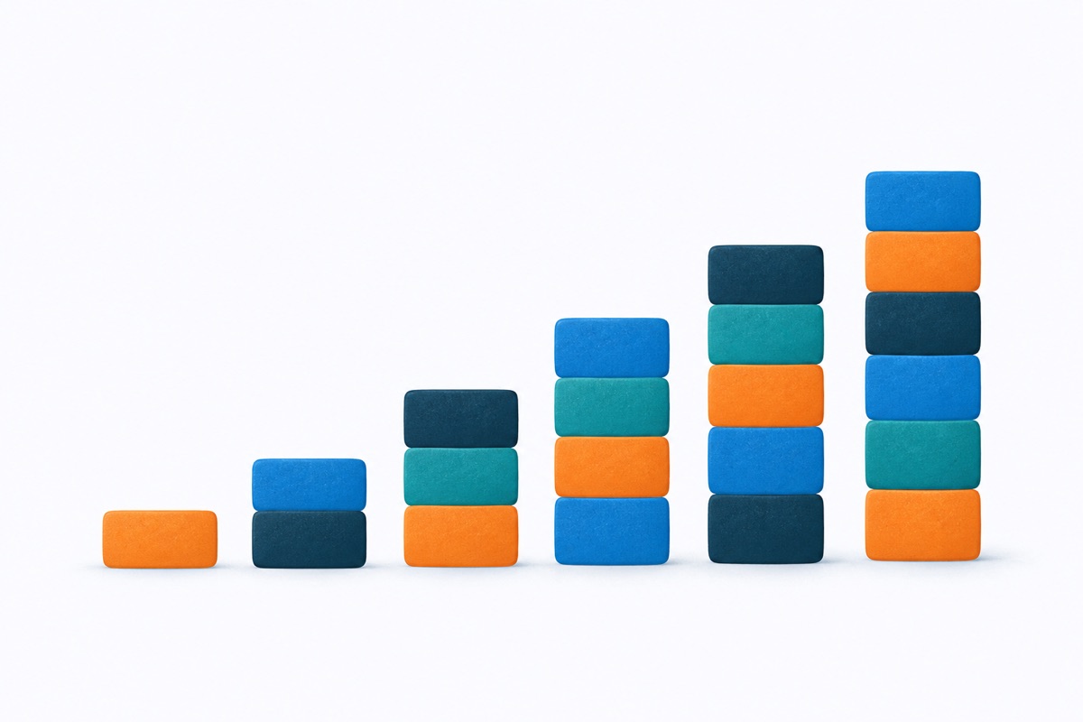 A row of small stacked blocks growing taller step by step from left to right, each block the same size.